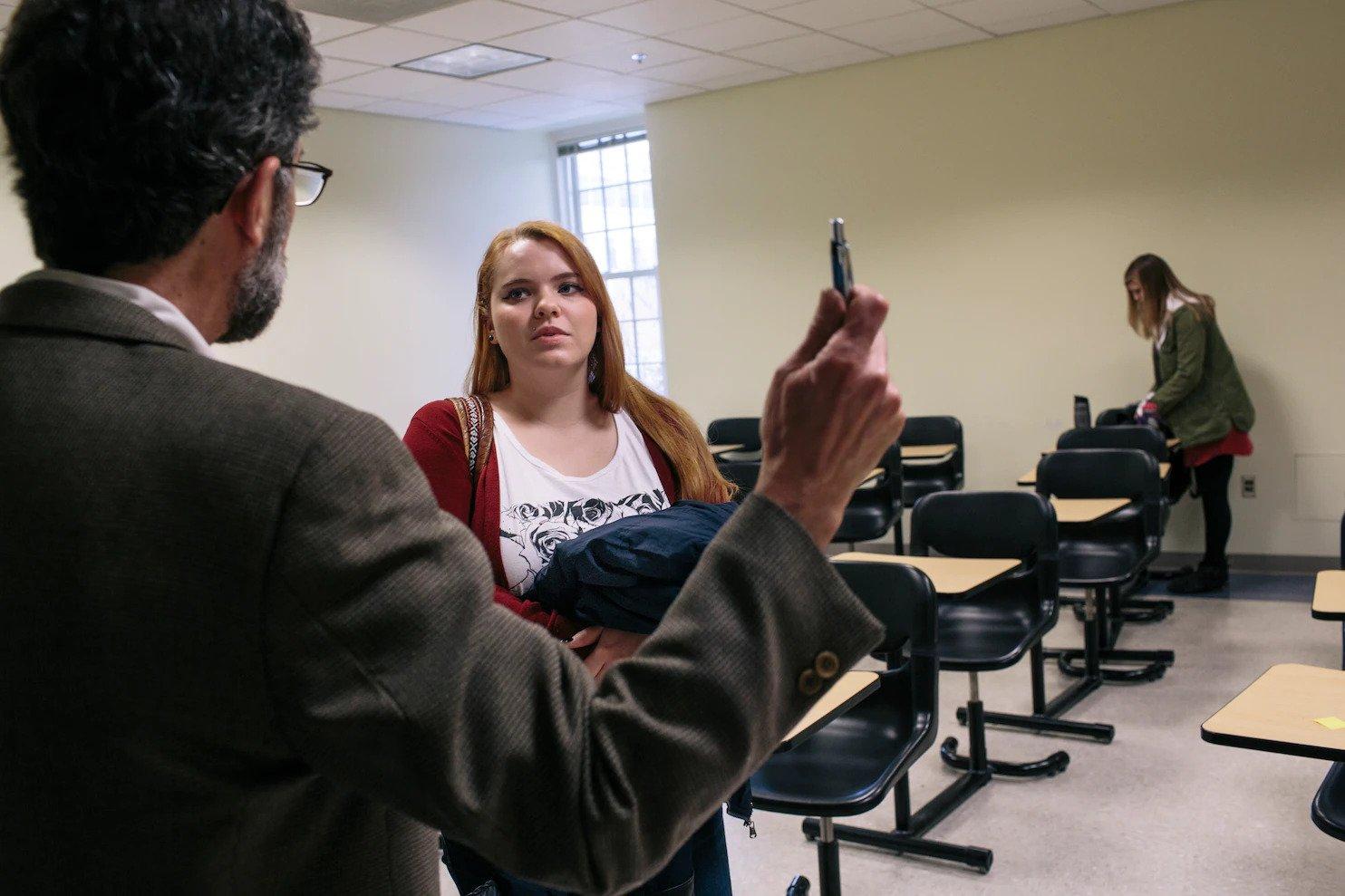 Robert Levine speaking to student